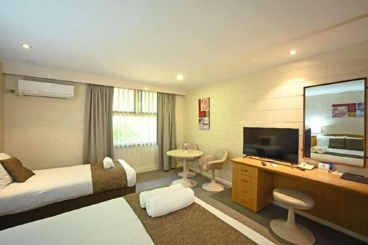 Minibar, laptop workspace, blackout drapes, iron/ironing board