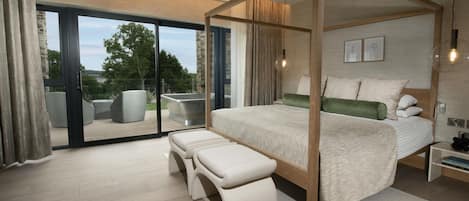 Suite monolocale Deluxe | Minibar, una cassaforte in camera, una scrivania, postazione laptop