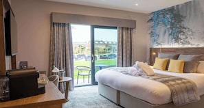 Executive Room, 1 King Bed, Patio, Garden View | 1 bedroom, in-room safe, individually decorated, iron/ironing board
