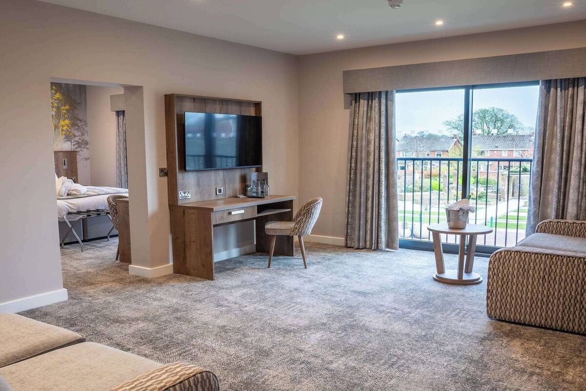 Suite, 1 King Bed, Balcony, Garden View | In-room safe, iron/ironing board, free WiFi, individually decorated