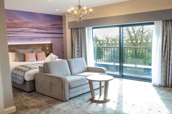 Junior Suite, 1 King Bed, Balcony, Garden View | In-room safe, individually decorated, iron/ironing board, free WiFi