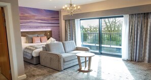 Junior Suite, 1 King Bed, Balcony, Garden View