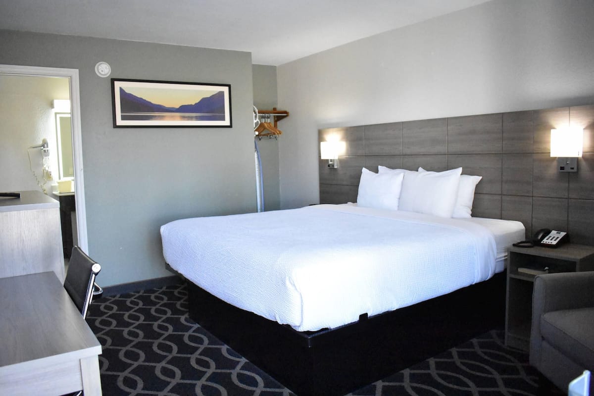 Chambre, 1 trÚs grand lit, accessible aux personnes à mobilité réduite, non-fumeur