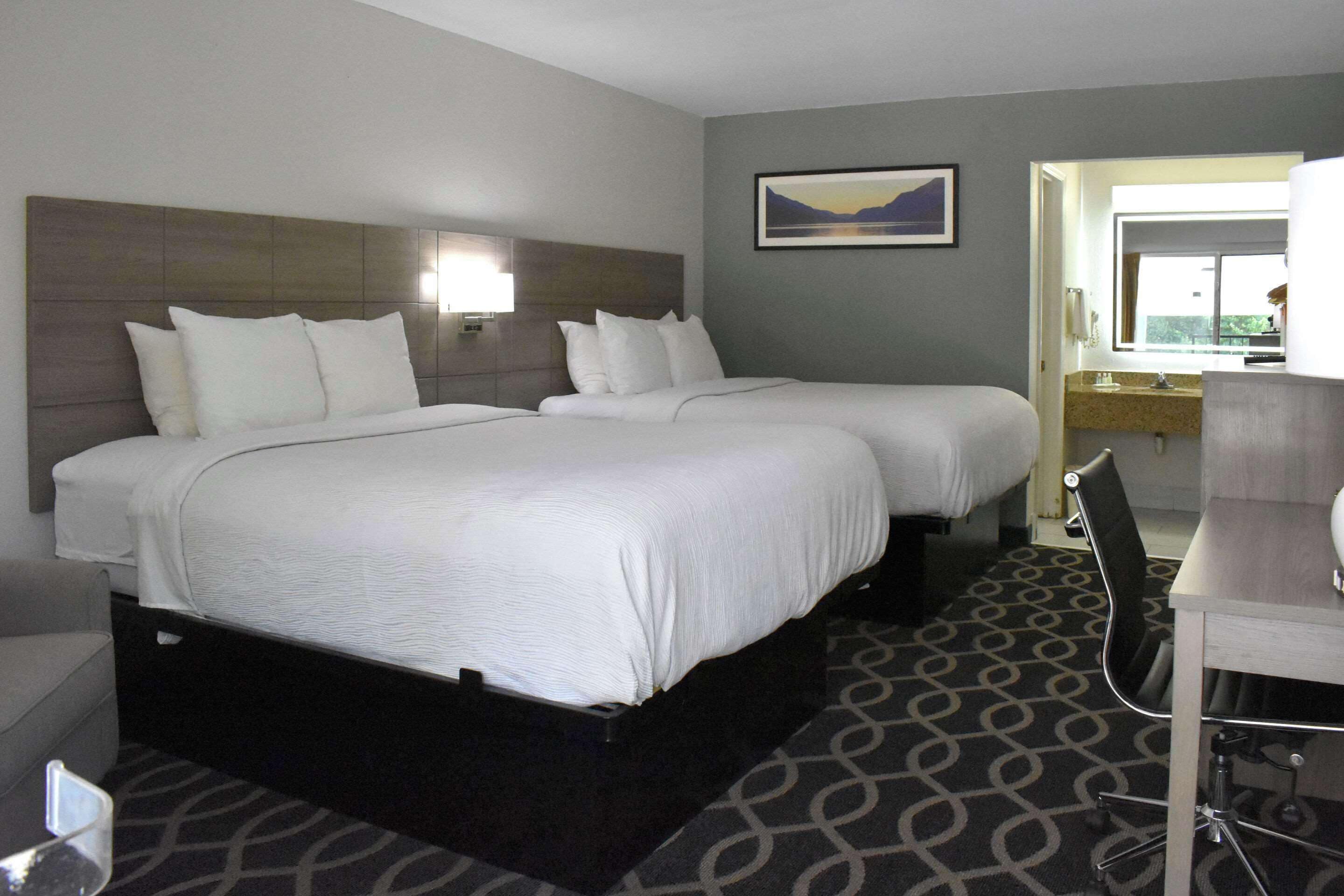 Room, 2 Queen Beds, Non Smoking | Desk, iron/ironing board, free WiFi, bed sheets