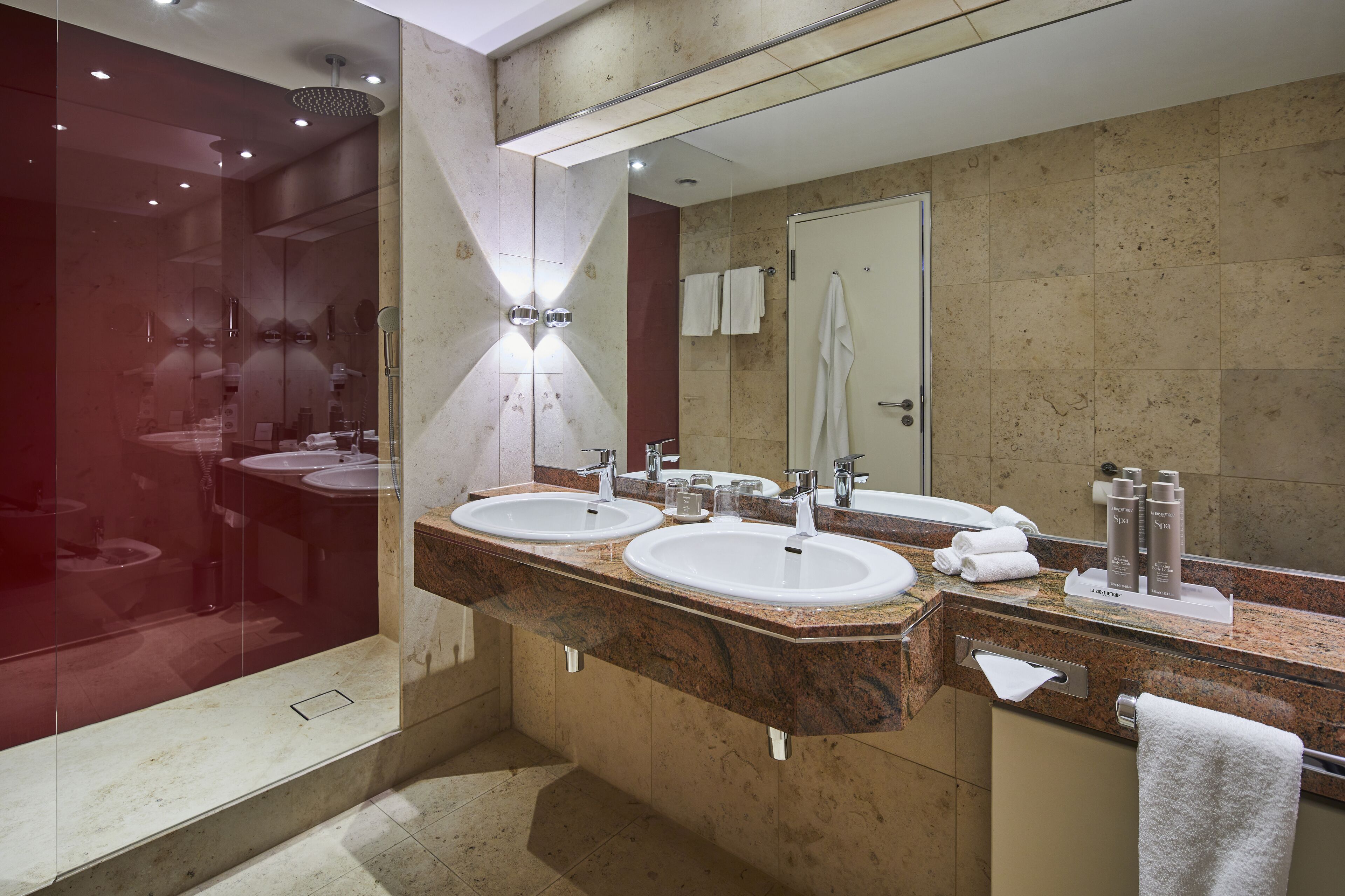 superior suite | bathroom | shower, hair dryer, bathrobes, slippers