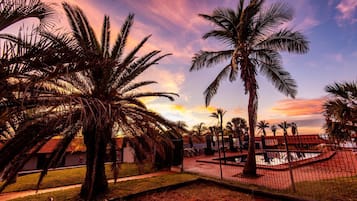 Outdoor pool, open 7:00 AM to 7:00 PM, pool loungers