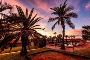 Outdoor pool, open 7:00 AM to 7:00 PM, sun loungers