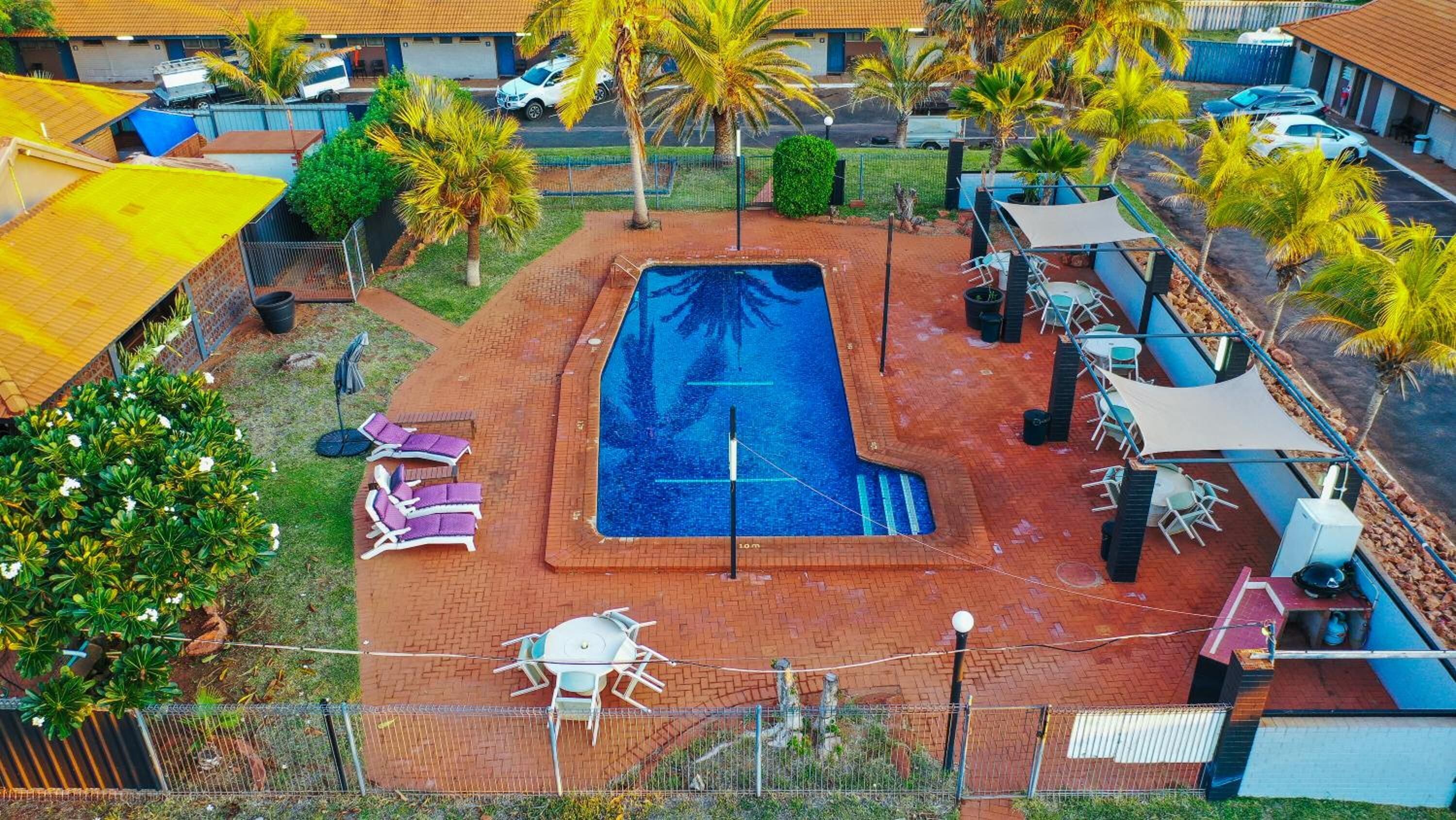 Outdoor pool, open 7:00 AM to 7:00 PM, sun loungers