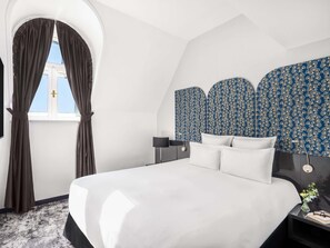 Suite junior, 1 cama matrimonial (and sofa) | Ropa de cama hipoalergénica y minibar 