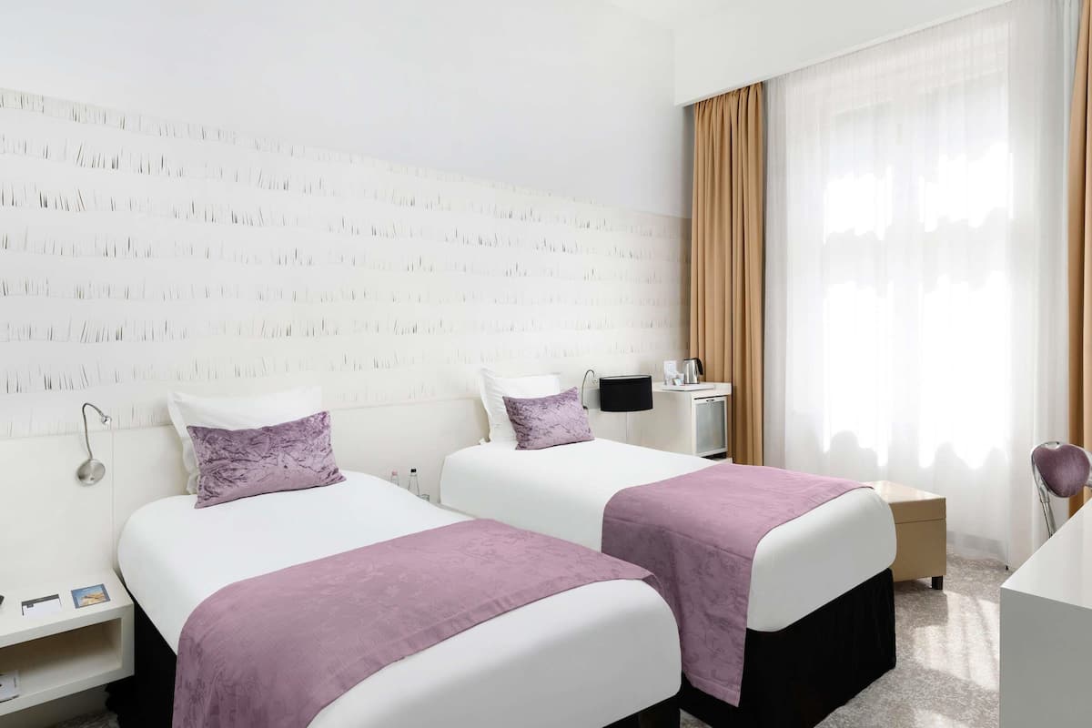 Hypo-allergenic bedding, minibar, in-room safe, desk