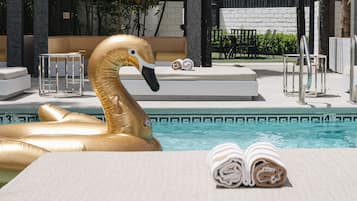 Outdoor pool, open 10:00 AM to 7:00 PM, pool cabanas (surcharge)
