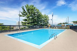 Outdoor pool, open 9:00 AM to 11:00 PM, pool loungers