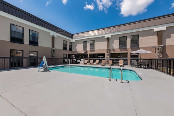 Seasonal outdoor pool, open 7:00 AM to 9:00 PM, pool umbrellas