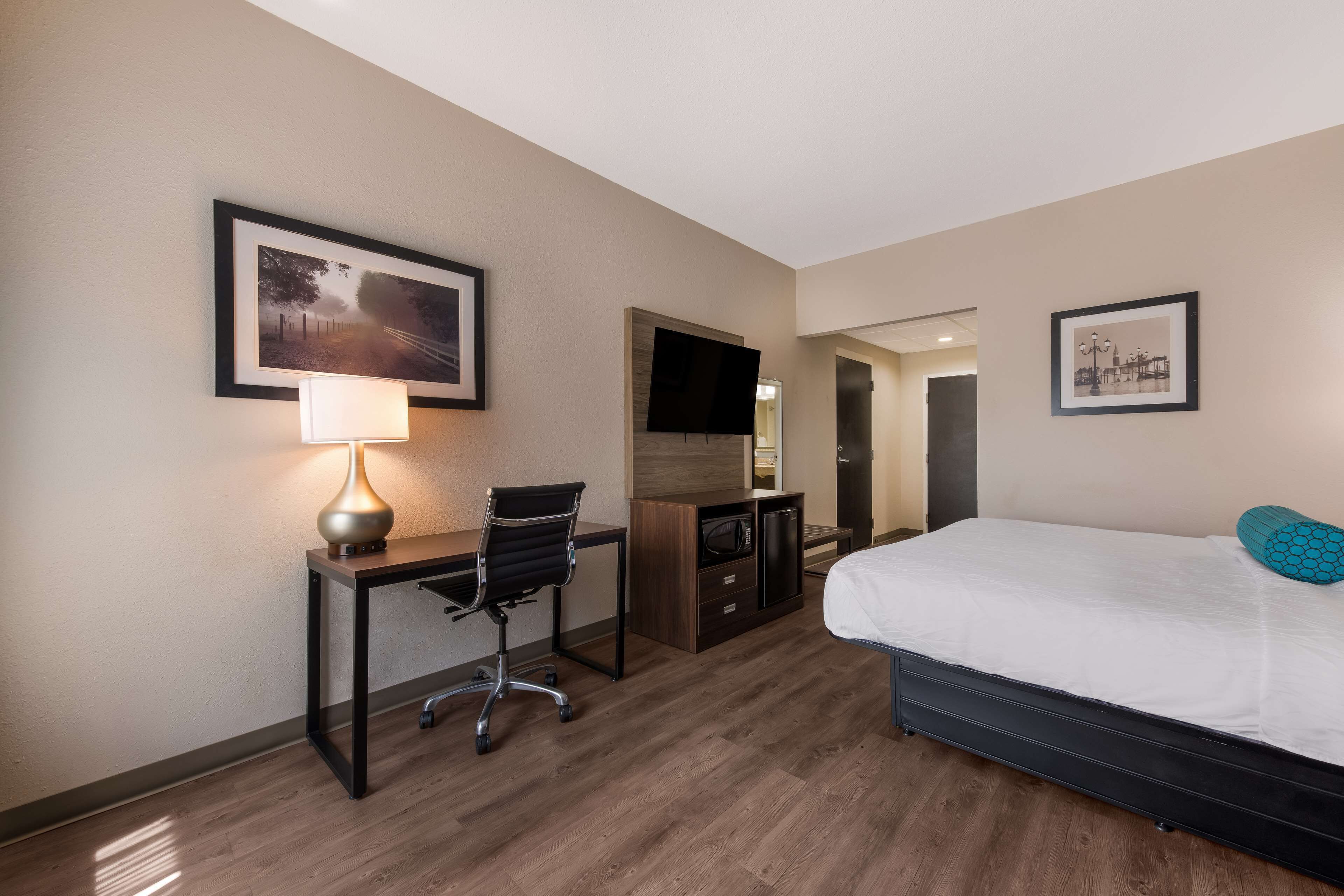 desk, laptop workspace, blackout curtains, iron/ironing board