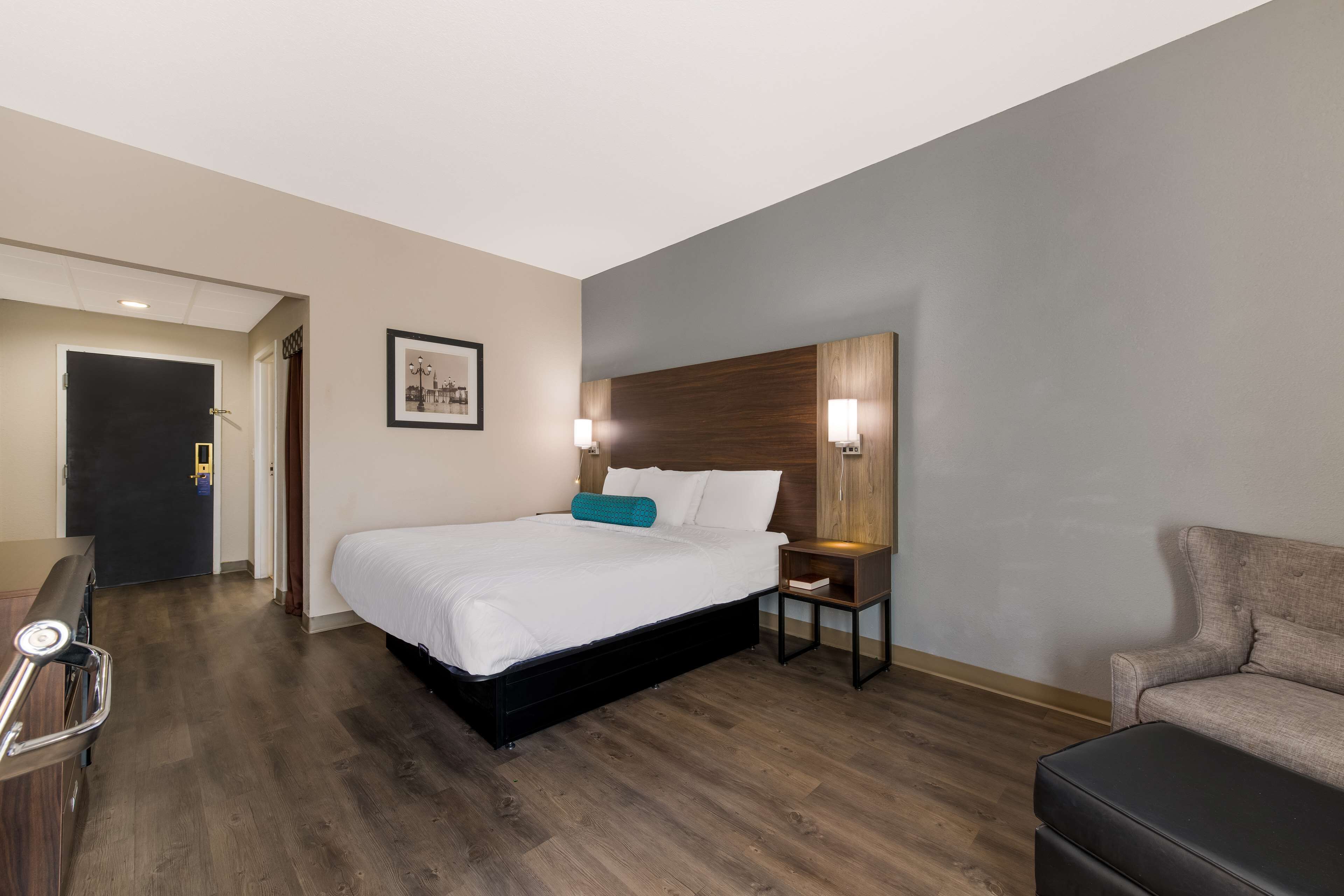 desk, laptop workspace, blackout curtains, iron/ironing board