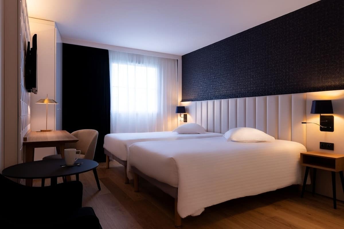 comfort twin room | premium bedding, in-room safe, desk, laptop workspace