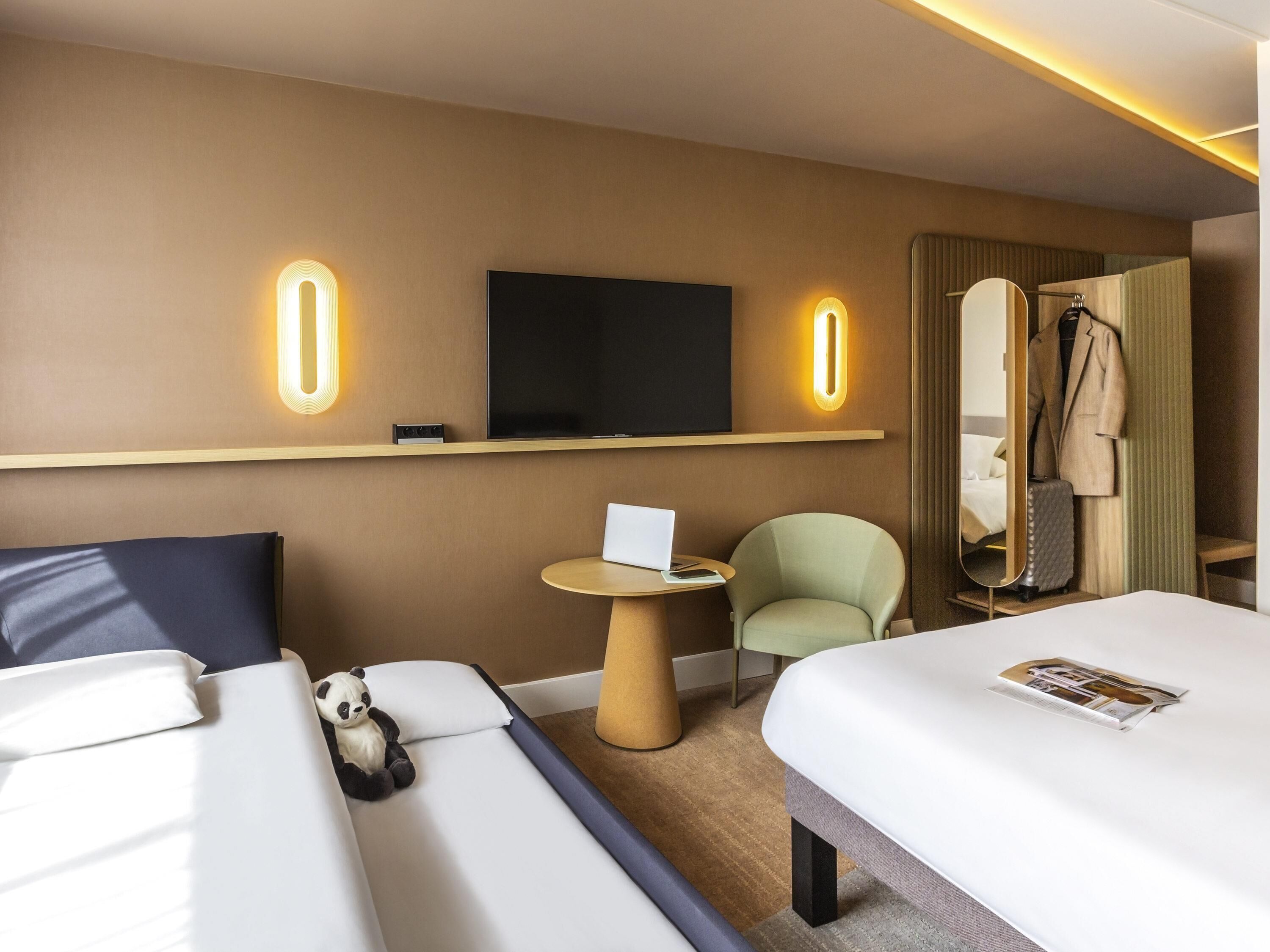 family room, multiple beds | premium bedding, in-room safe, desk, laptop workspace