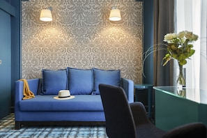 Family Suite | Living area | Flat-screen TV