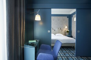 Suite familiar | Ropa de cama de alta calidad y minibar 
