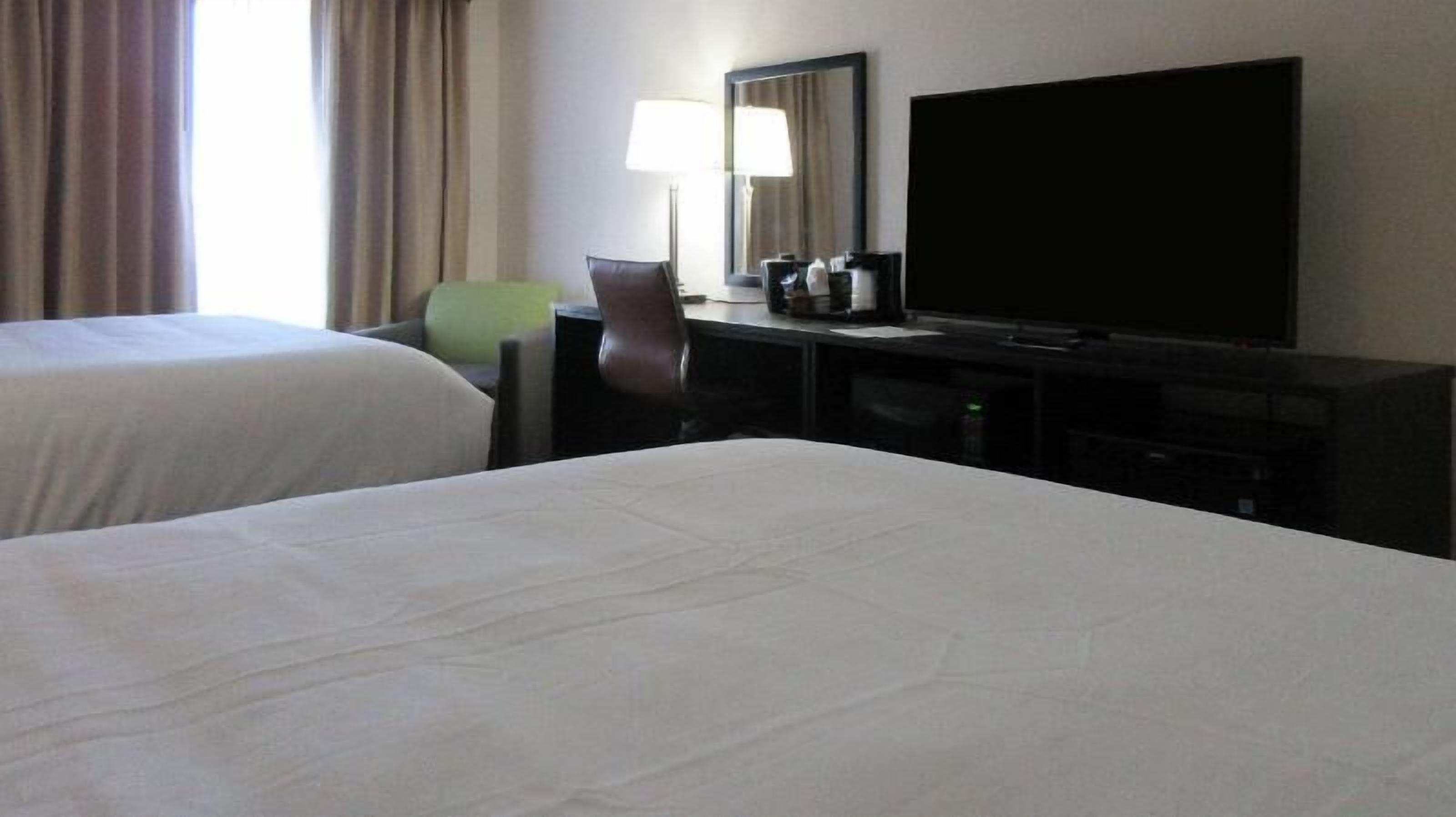 Premium bedding, down comforters, pillowtop beds, desk