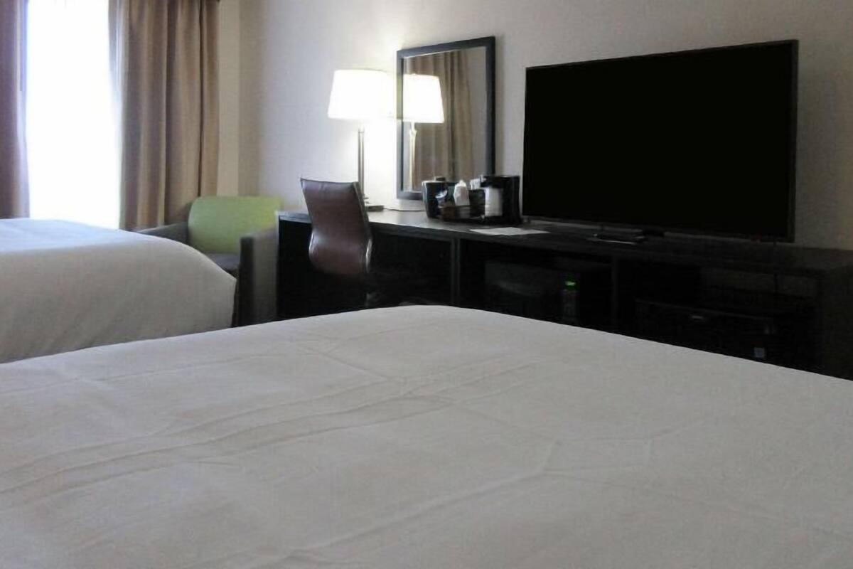 Premium bedding, down comforters, pillowtop beds, desk
