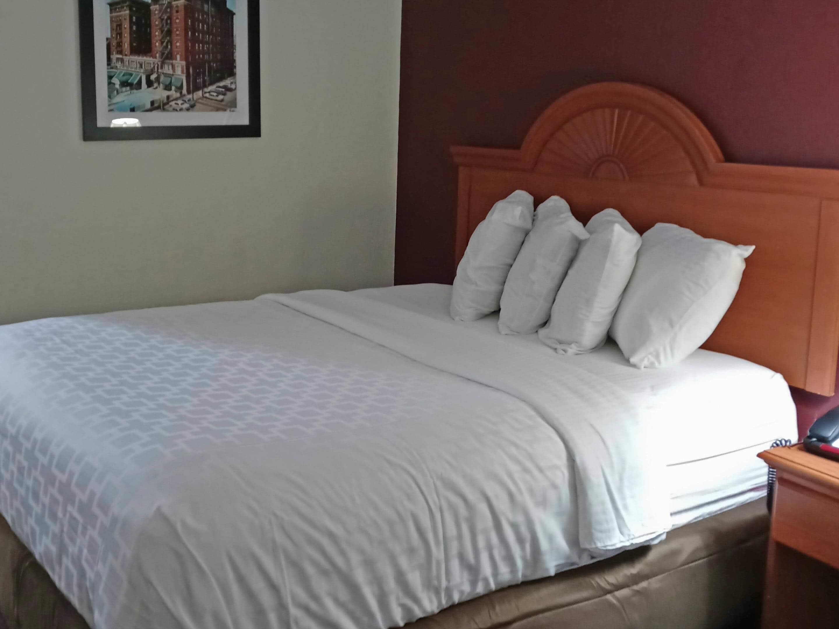 Premium bedding, down comforters, pillowtop beds, desk