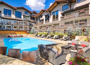Outdoor pool, open 8:00 AM to 10:00 PM, pool umbrellas, pool loungers