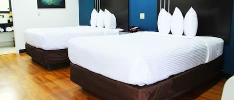 Desk, laptop workspace, blackout drapes, iron/ironing board