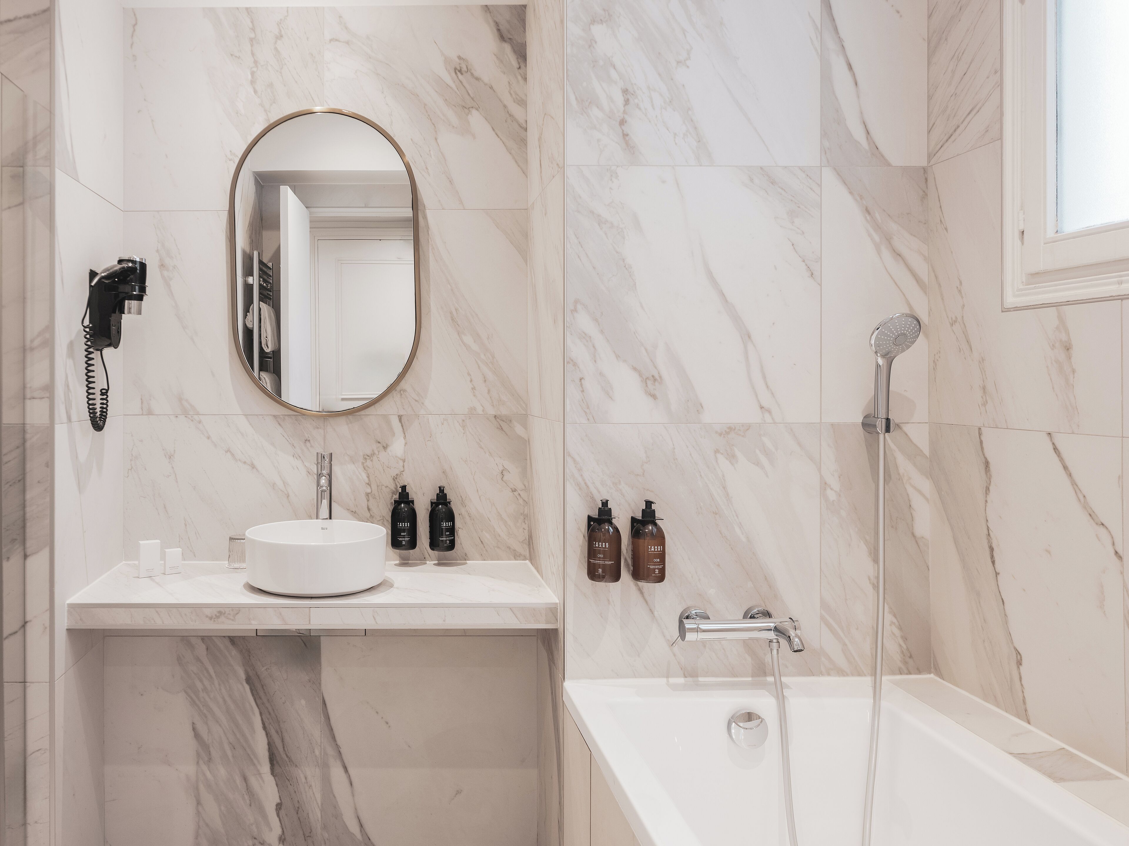 eco-friendly toiletries, hair dryer, towels