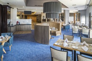 Breakfast, lunch, dinner served; international cuisine, garden views 