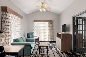 Suite, 1 King Bed, Non Smoking | Premium bedding, desk, blackout drapes, iron/ironing board