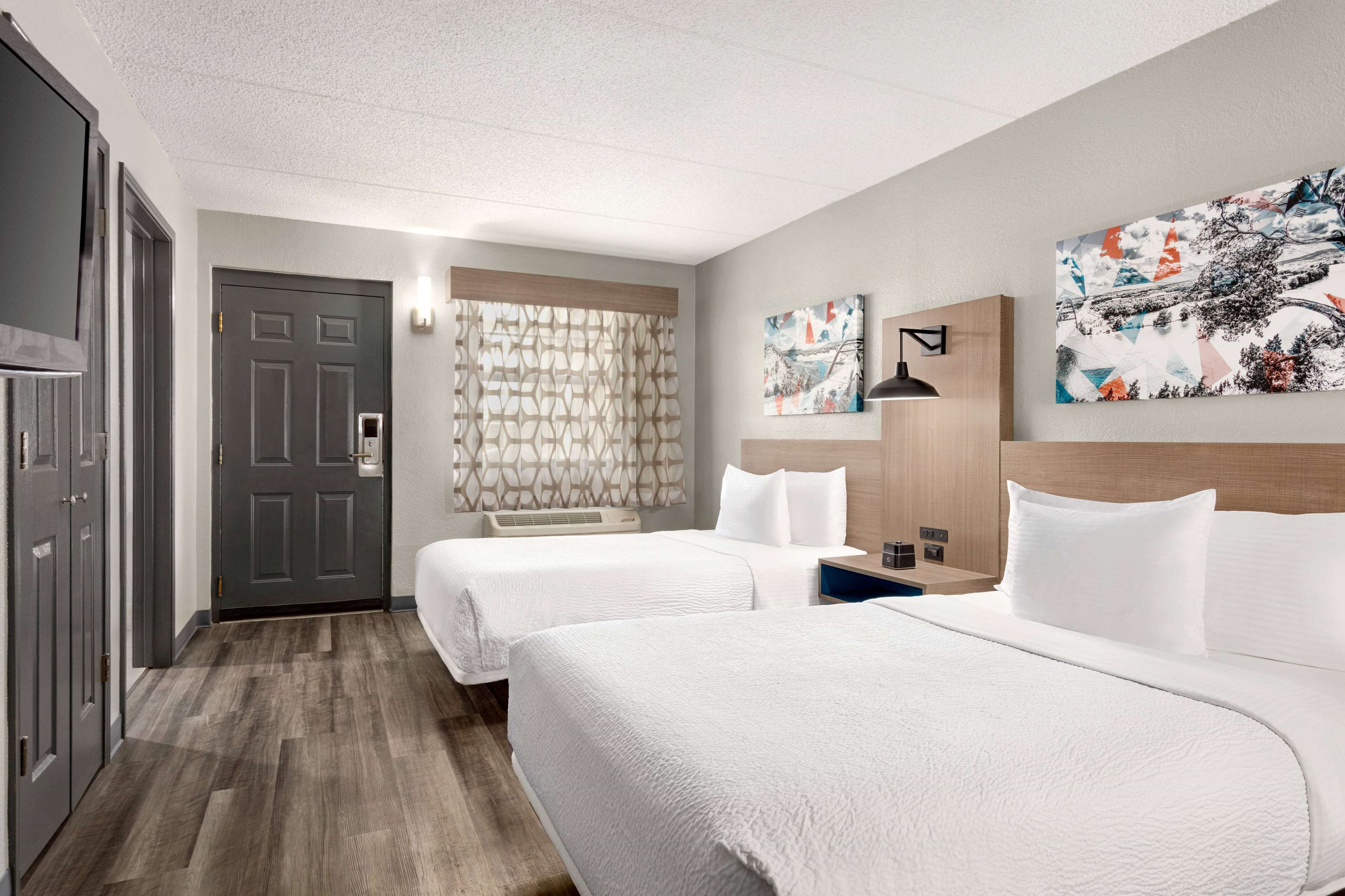 Premium bedding, desk, blackout curtains, iron/ironing board