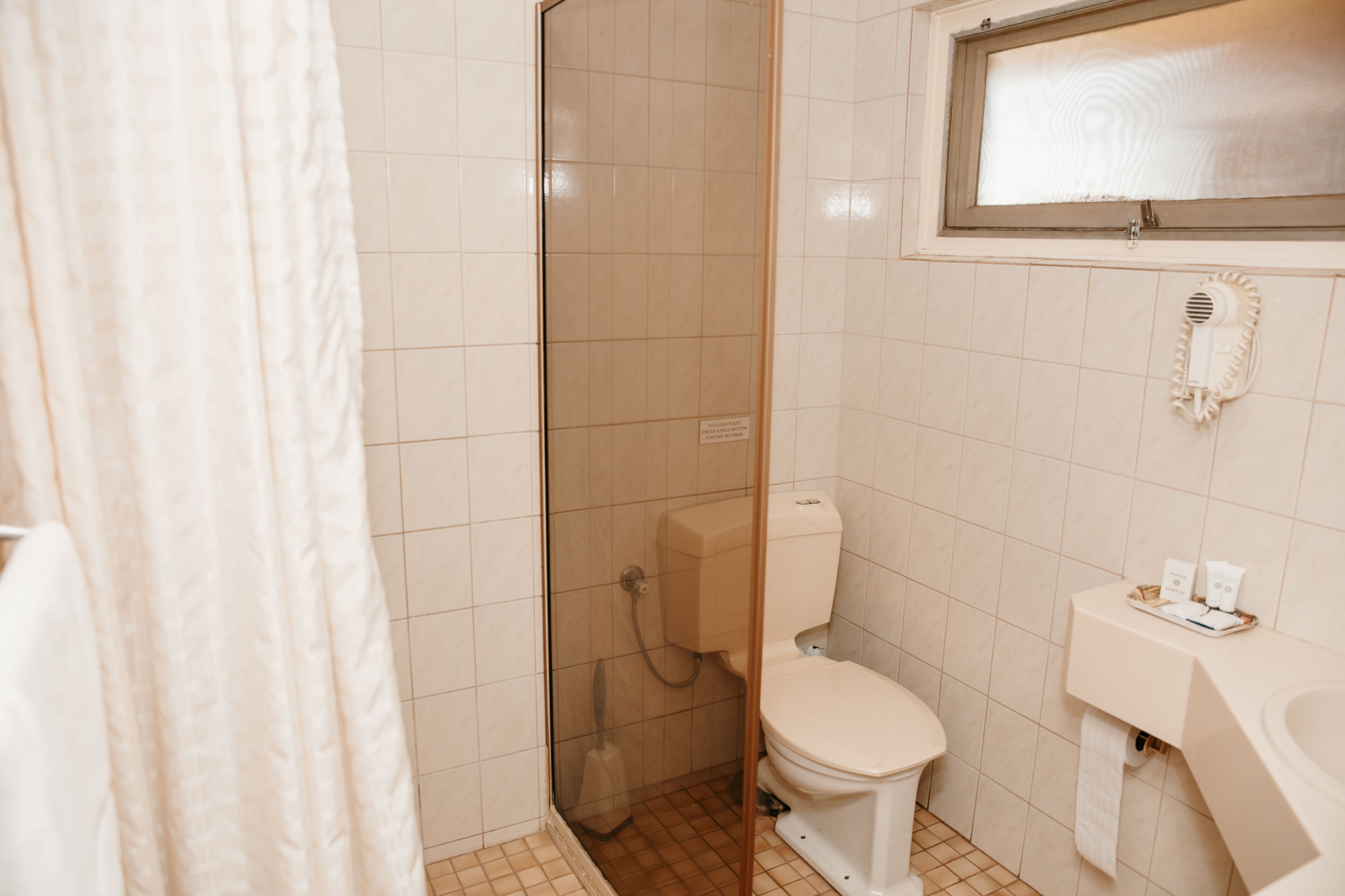family room | bathroom | shower, free toiletries, hair dryer, towels