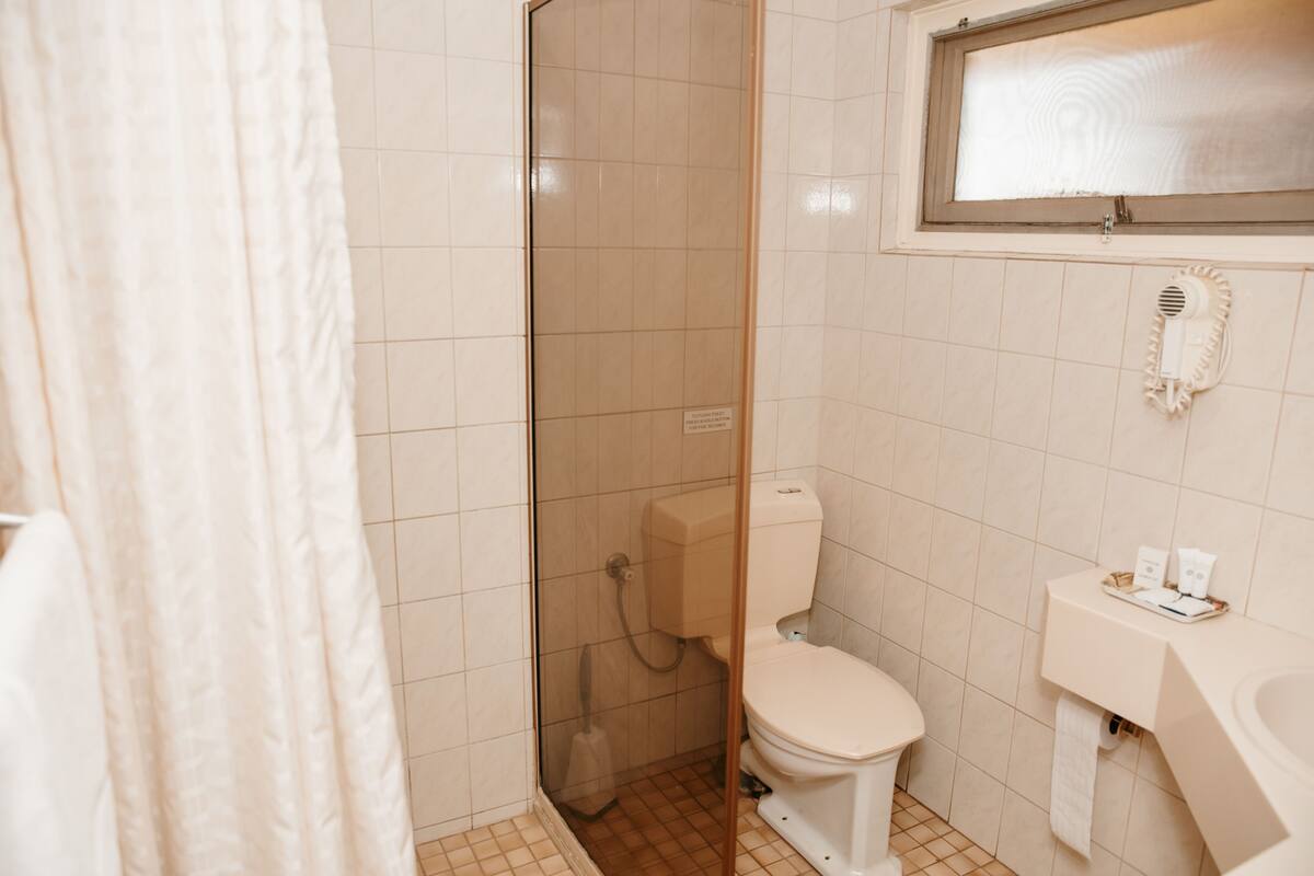 family room | bathroom | shower, free toiletries, hair dryer, towels