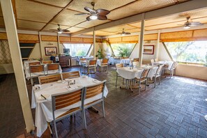 Breakfast, dinner served; international cuisine, al fresco dining 