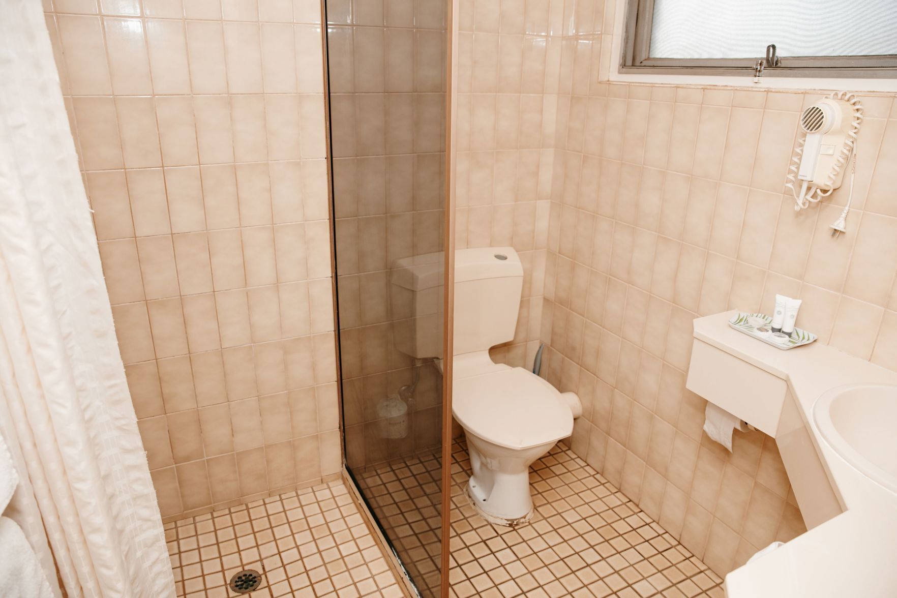 Bathroom | Shower, eco-friendly toiletries, hair dryer, towels