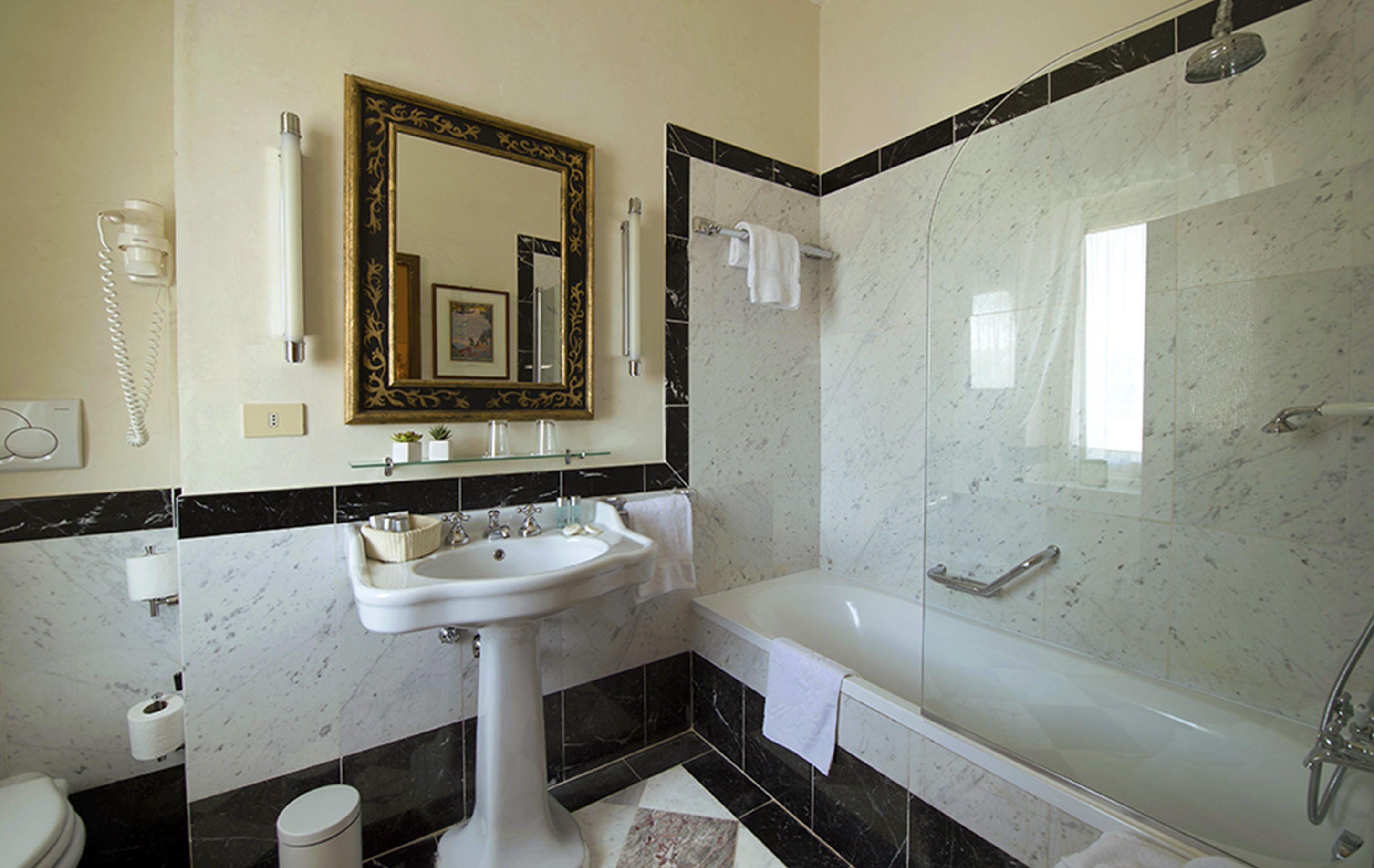 free toiletries, hair dryer, slippers, bidet