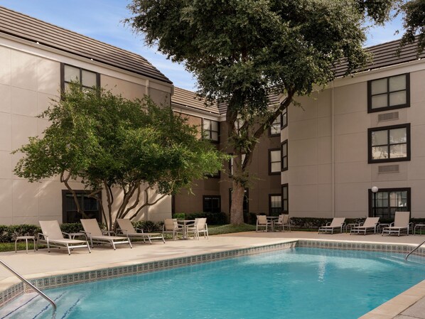 Seasonal outdoor pool, open 8:00 AM to 10 PM, pool loungers