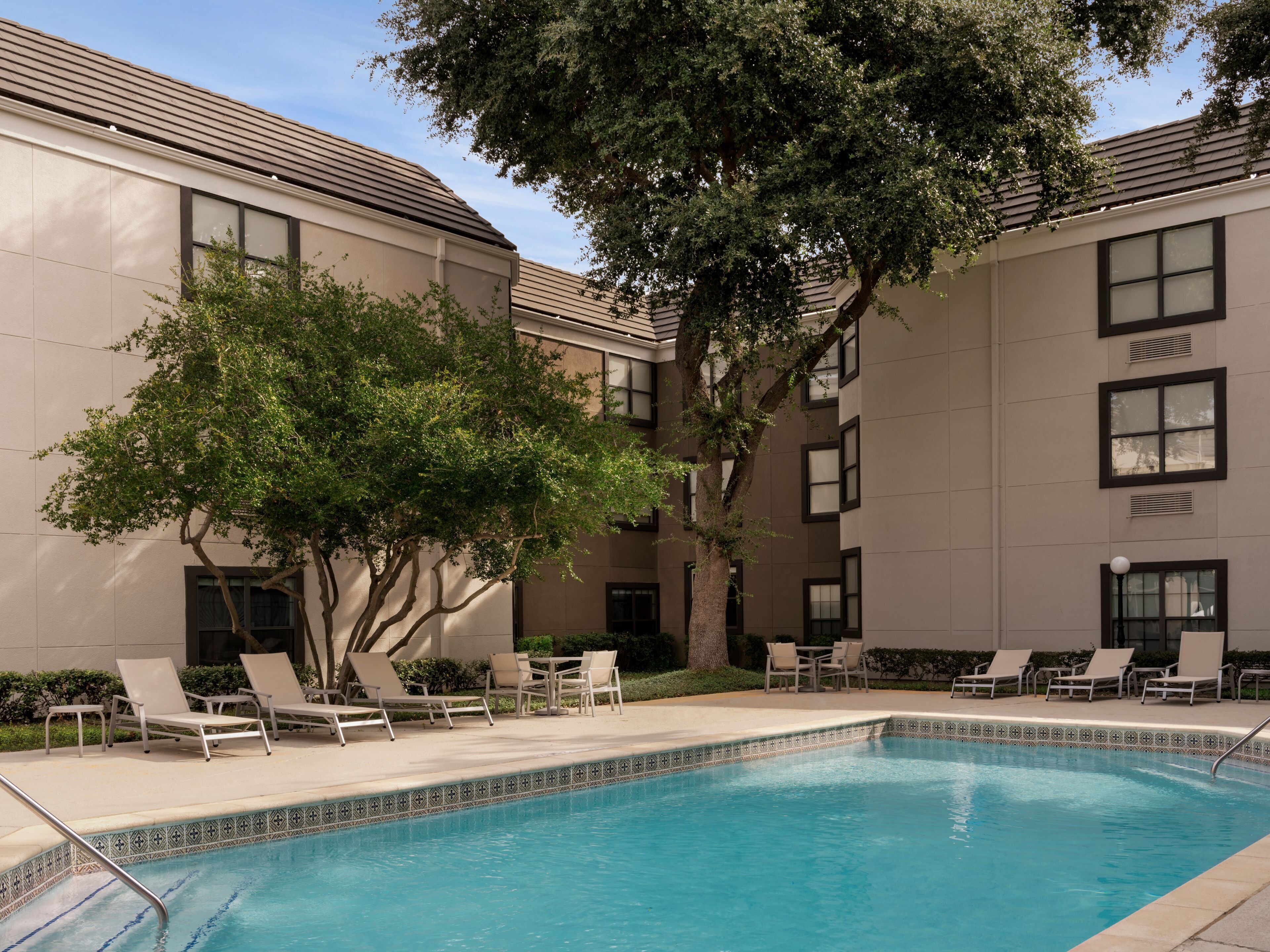 Seasonal outdoor pool, open 8:00 AM to 10 PM, pool loungers