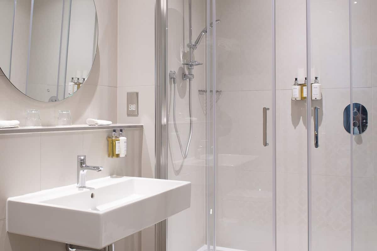 vintage suite | bathroom | eco-friendly toiletries, hair dryer, towels, soap