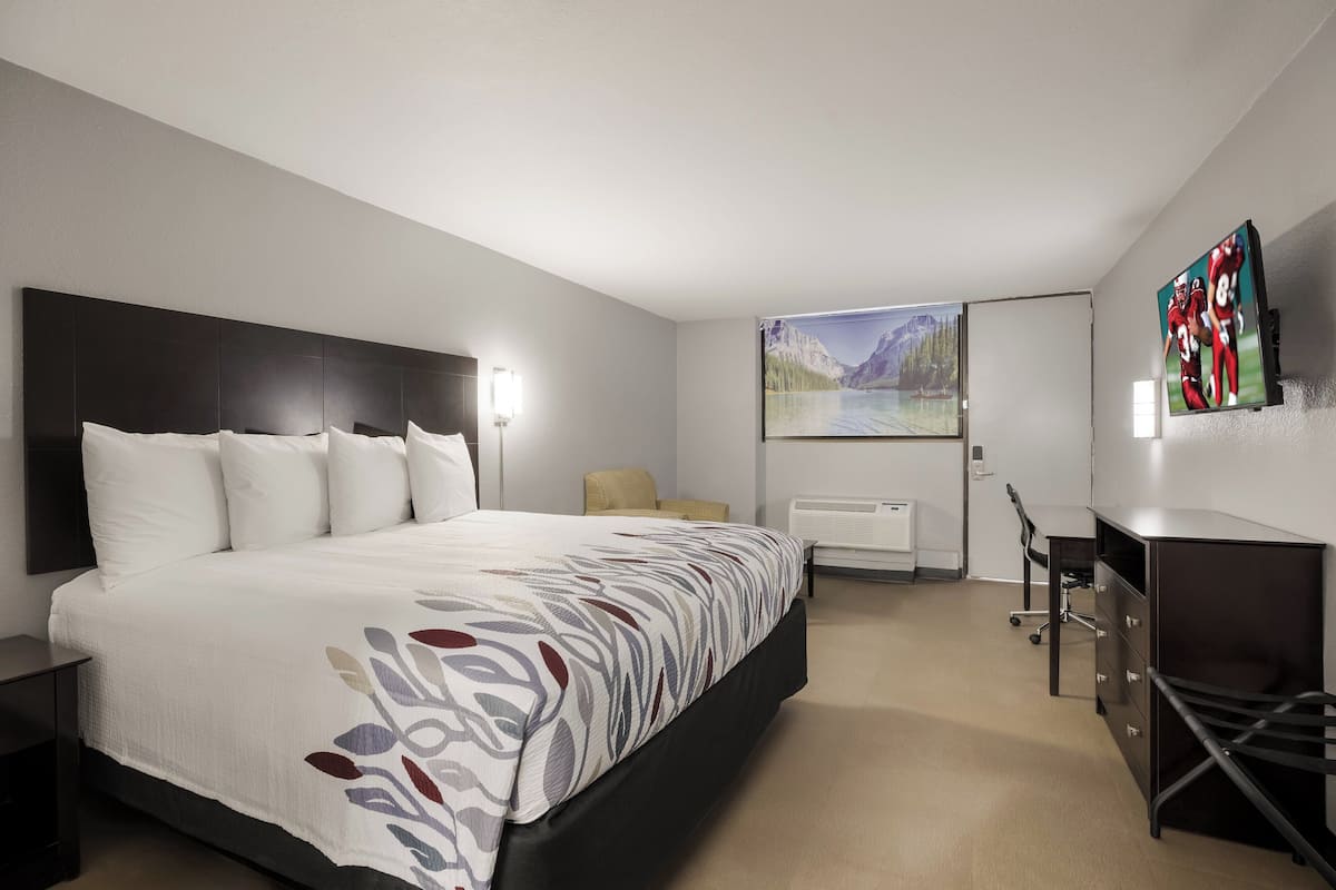 Premium bedding, down comforters, desk, laptop workspace