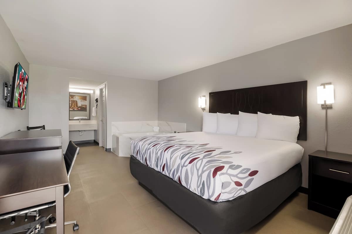 Premium bedding, down comforters, desk, laptop workspace