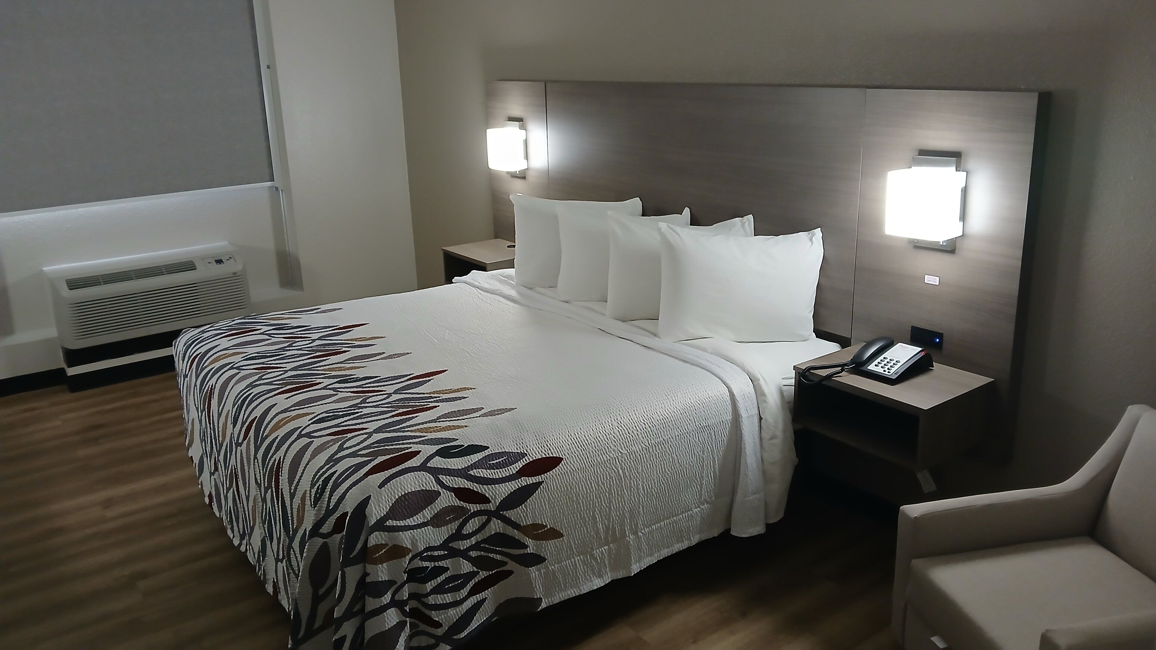 Premium bedding, down comforters, desk, laptop workspace