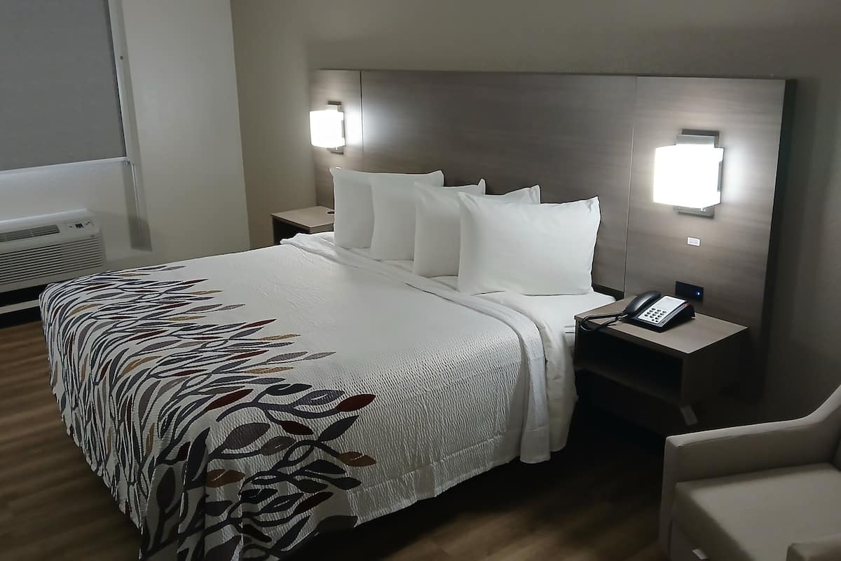 Premium bedding, down comforters, desk, laptop workspace