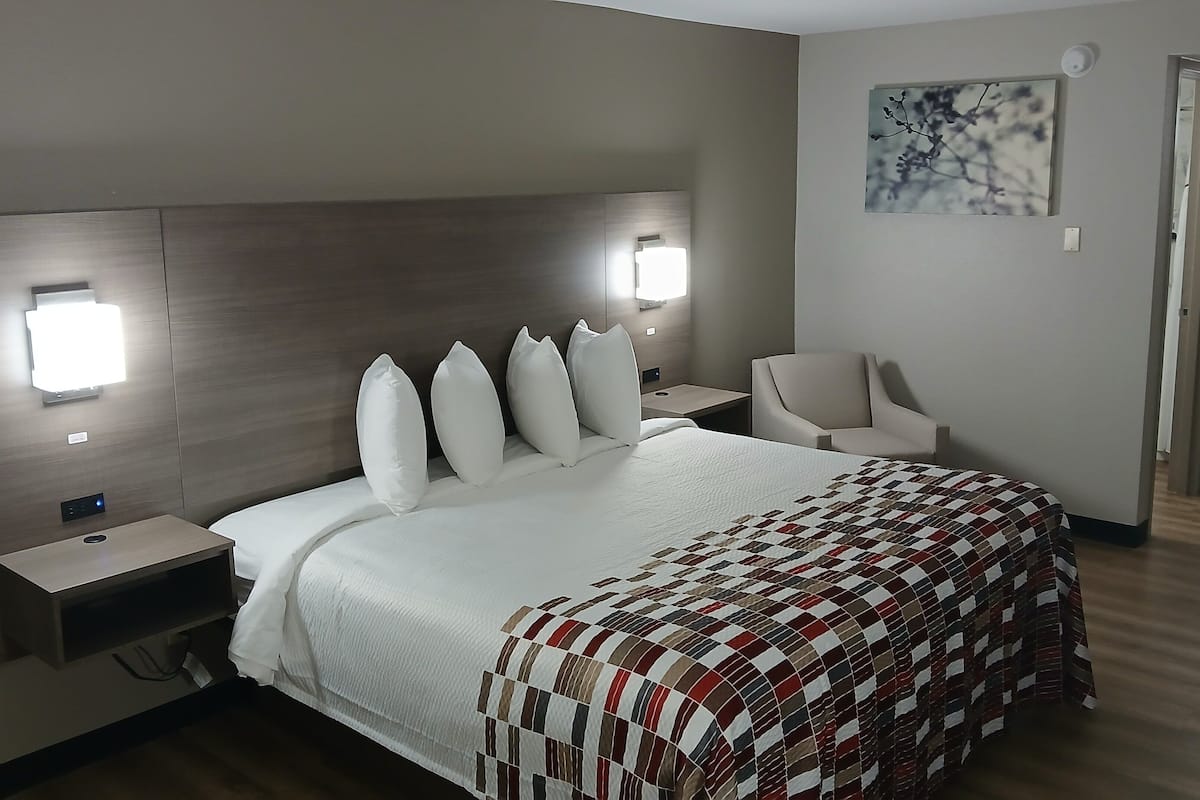 Premium bedding, down comforters, desk, laptop workspace