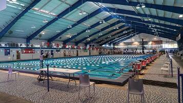 Outdoor pool, open 9:00 AM to 10:00 PM, pool umbrellas, pool loungers