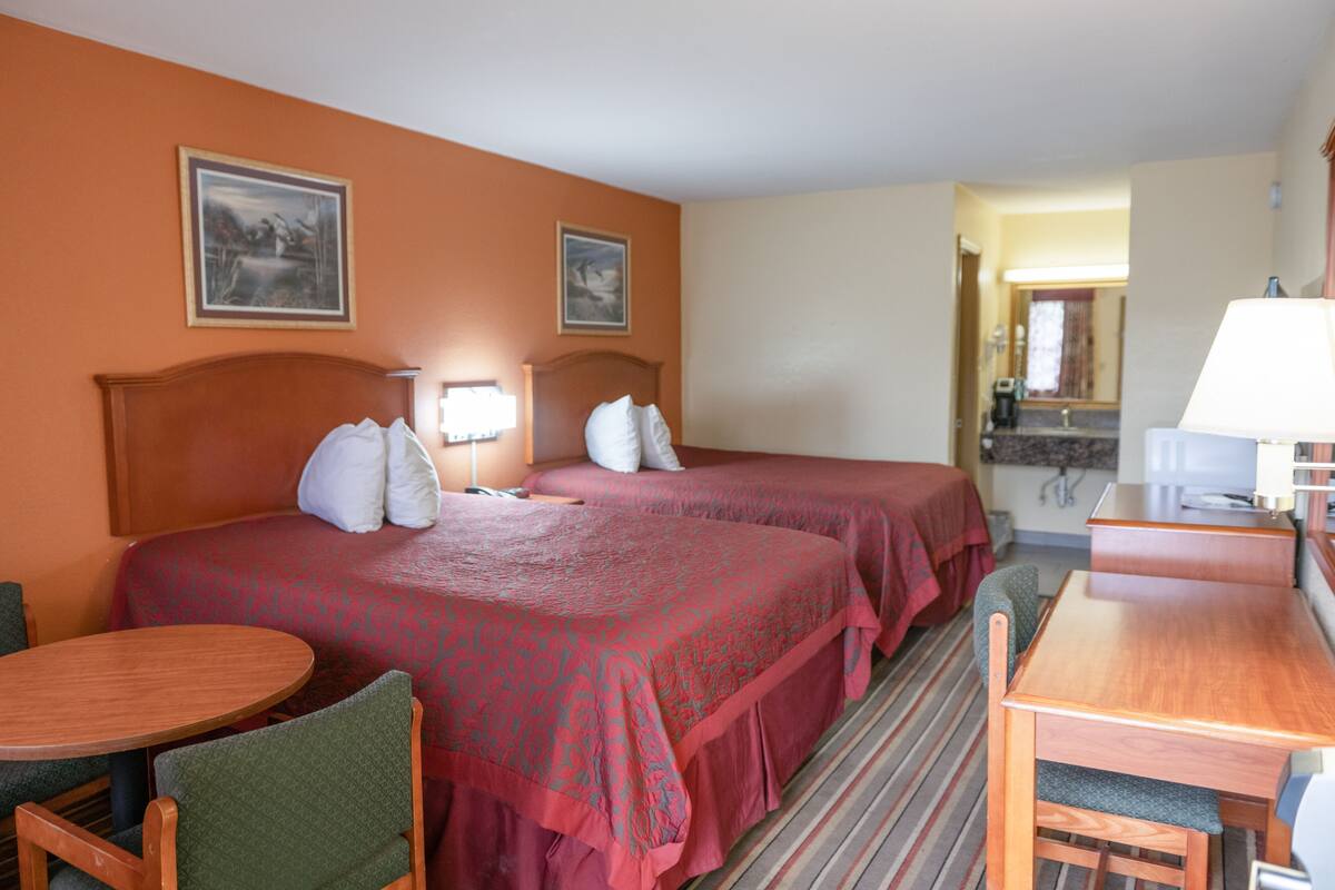 Pillowtop beds, desk, laptop workspace, blackout drapes
