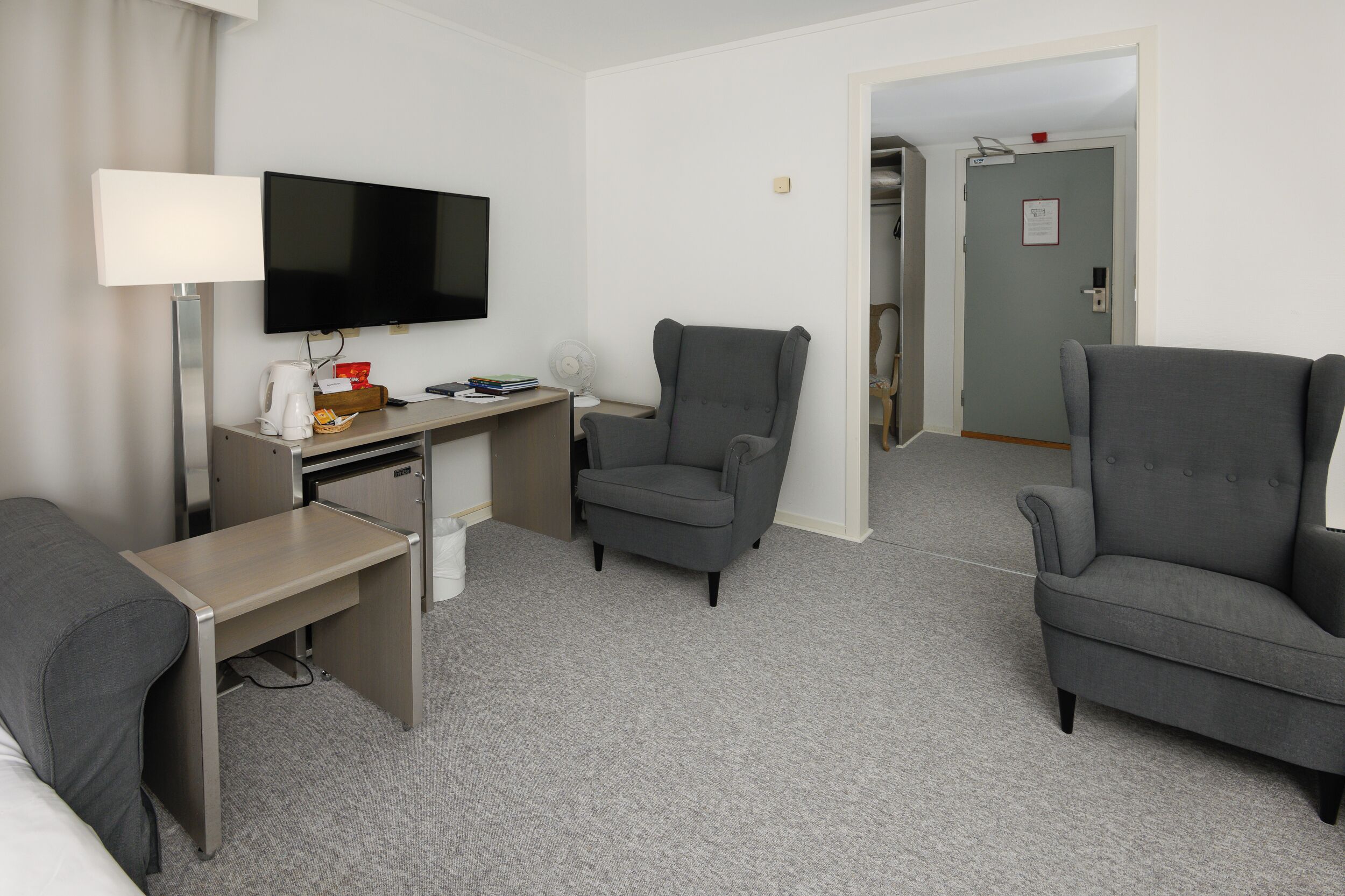 family room | desk, iron/ironing board, cots/infant beds, travel cot