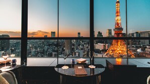 A high-rise room with a panoramic view of a city skyline and a prominent tower. - The Prince Park Tower Tokyo - Preferred Hotels & Resorts, LVX Collection (Tokyo)