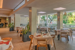 Breakfast, lunch, dinner served; international cuisine, pool views